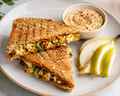 Paneer Stuffed sandwich with Dip and Pear