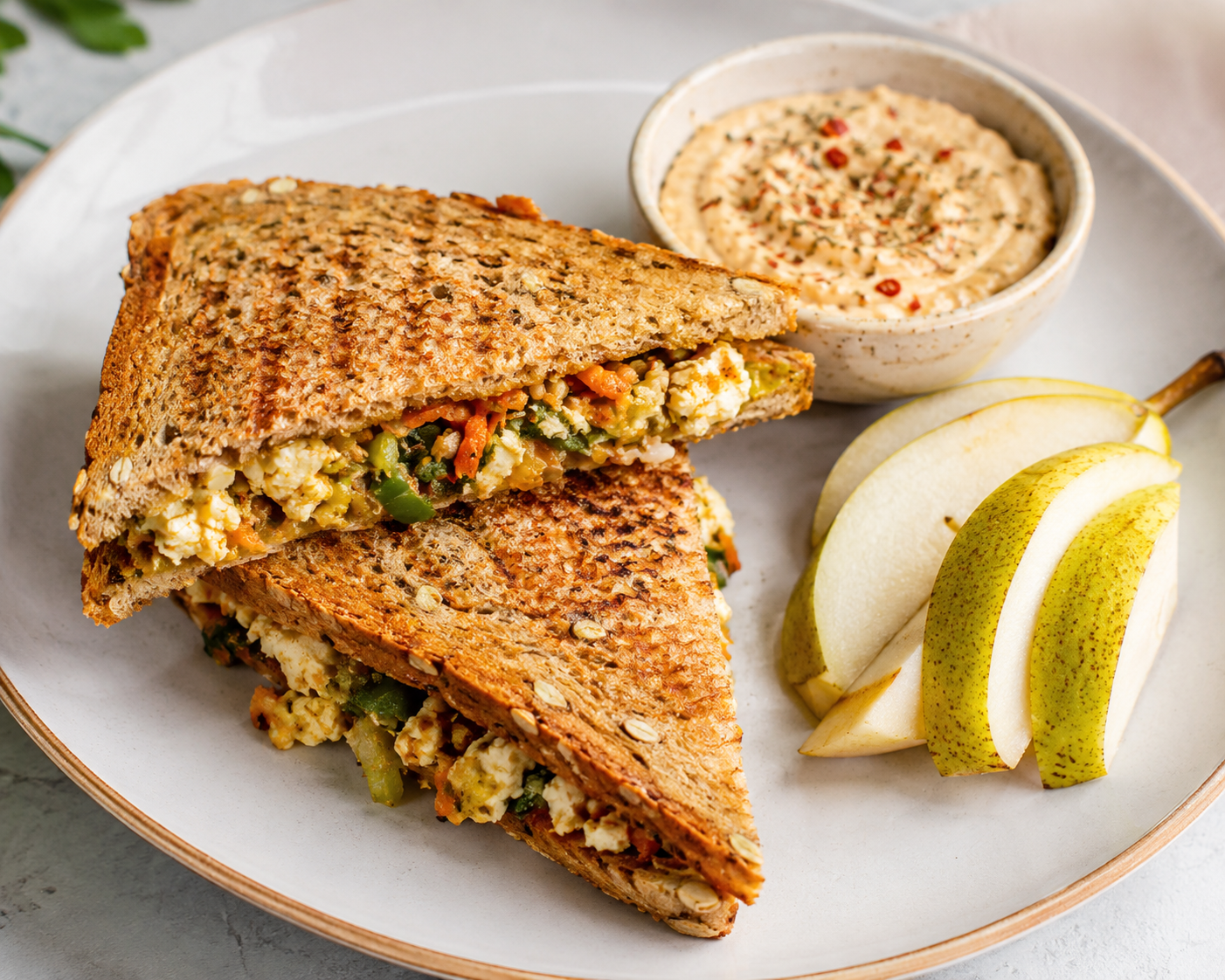 Paneer Stuffed sandwich with Dip and Pear