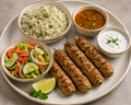 Herb rice with chicken seekh kebab, tomato rasam, garlic yogurt and Veg salad