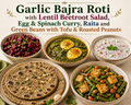 Garlic Bajra Roti with Lentil Beetroot Salad, Egg & Spinach Curry, Raita and Green Beans with Tofu & Roasted Peanuts