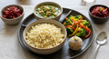 Little millet rice bowl chicken mint gravy or garlic tomato fish curry, broccoli bell pepper fry, beet root carrot salad, lotus seed ladoo