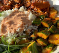 Jasmine rice with vegetable kurma, cucumber sesame salad, yogurt dip
