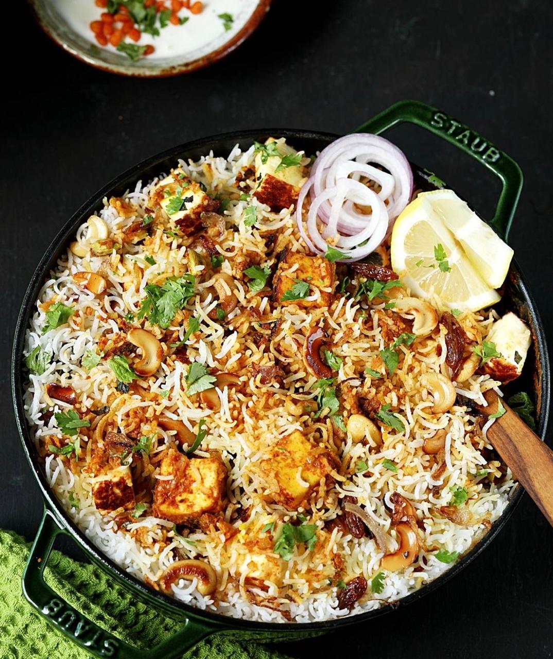 Rice with Paneer Chettinad, Veg gravy, Onion raita and Sprouted Moong Salad