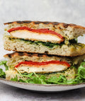 Grilled Chicken Pesto Sandwich, Fruit, Mixed Seeds and Sesame Dip